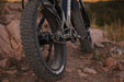 Bakcou MAV3 The MAV3 features the diesel engine of mid-drive electric motors, built with all-metal gearing and strong enough to conquer rugged terrain with ease.  The Rohloff internal gear hub has a larger gear ratio, the ability to change gears without pedaling, and less maintenance. Dual 48 volt 15 amp hour batteries equipped to take you farther and keep you riding longer.  Stealthy, low profile mobility built for any situation.